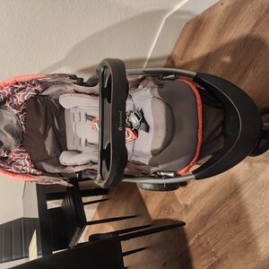 Gray and Orange Baby Stroller